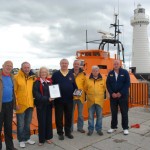 Lifeboat crew say thanks to landlord and regulars of the Cock and Bottle